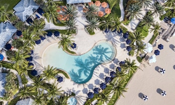 4 outdoor pools, cabanas (surcharge), pool umbrellas