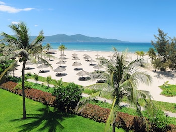 Private beach, white sand, sun loungers, beach umbrellas