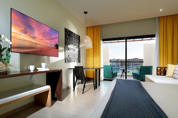 Junior Suite Marina View + EXCLUSIVE Cap Cana Benefits | Premium bedding, memory foam beds, minibar, in-room safe