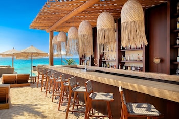 Private beach nearby, free beach shuttle, beach bar