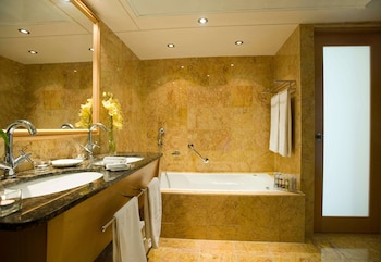 Separate tub and shower, eco-friendly toiletries, hair dryer, bathrobes