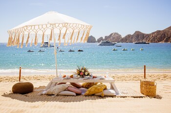 Private beach, beach umbrellas, beach towels, beach massages