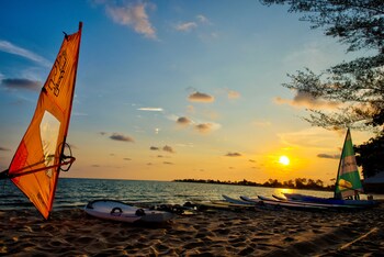 Private beach, white sand, sun loungers, beach umbrellas