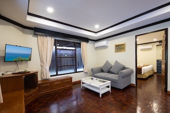 Two Bedrooms Family Villa | Living area | 32-inch LED TV with cable channels, TV, table tennis