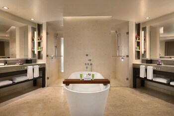 Ocean View Butler Junior Suite | Bathroom | Separate tub and shower, deep soaking tub, eco-friendly toiletries